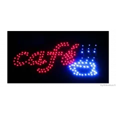 Kirkas led-kyltti Café -tekstillä.